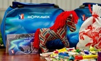 В этом году новогодние подарки для детей Норильска будут украшены символикой города